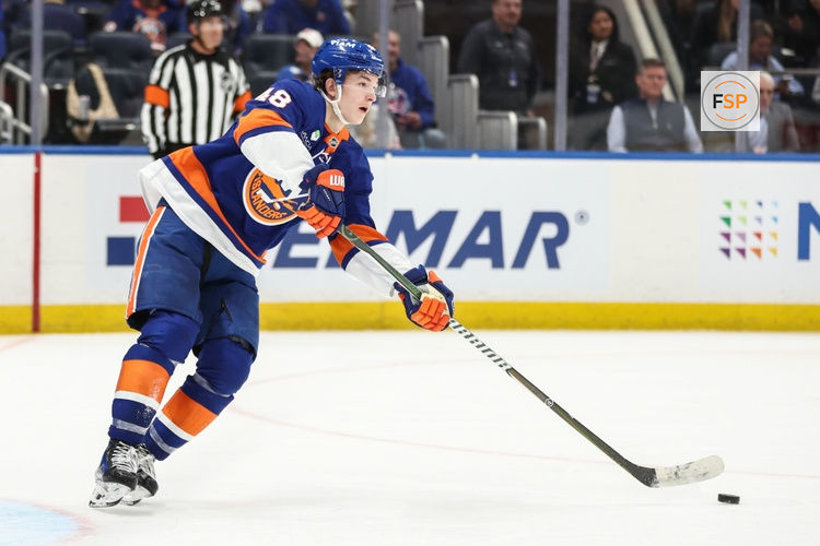 Apr 9, 2026; Elmont, New York, USA;  New York Islanders defenseman Matthew Schaefer (48) plays the puck in the third period against the Toronto Maple Leafs at UBS Arena. Credit: Wendell Cruz-Imagn Images
