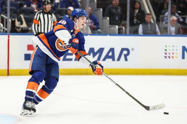 Apr 9, 2026; Elmont, New York, USA;  New York Islanders defenseman Matthew Schaefer (48) plays the puck in the third period against the Toronto Maple Leafs at UBS Arena. Mandatory Credit: Wendell Cruz-Imagn Images