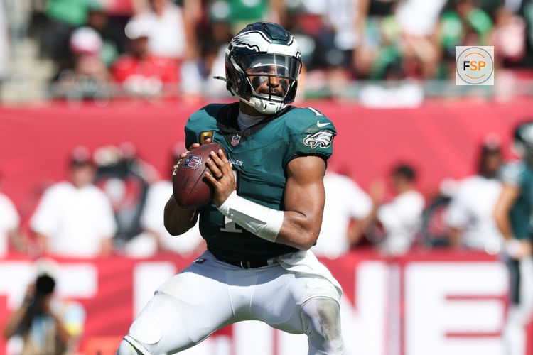 Sep 28, 2025; Tampa, Florida, USA; Philadelphia Eagles quarterback Jalen Hurts (1) prepares to throw the ball during the fourth quarter against the Tampa Bay Buccaneers at Raymond James Stadium. Credit: Nathan Ray Seebeck-Imagn Images