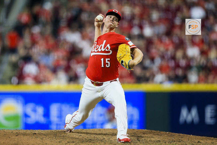Jun 3, 2025; Cincinnati, Ohio, USA; Cincinnati Reds relief pitcher Emilio Pagan (15) pitches against the Milwaukee Brewers in the ninth inning at Great American Ball Park. Credit: Katie Stratman-Imagn Images