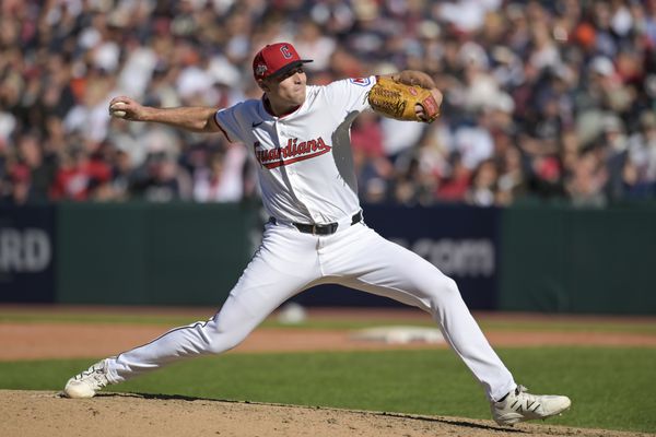 Oct 1, 2025; Cleveland, Ohio, USA; Cleveland Guardians pitcher Cade Smith (36) delivers a pitch against the Detroit Tigers in the eighth inning during game two of the Wildcard round for the 2025 MLB playoffs at Progressive Field. Mandatory Credit: Ken Blaze-Imagn Images