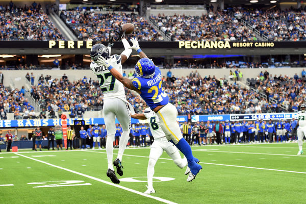 INGLEWOOD, CA - DECEMBER 04: Seattle Seahawks cornerback Tariq Woolen (27) catches a pass for an interception against Los Angeles Rams running back Kyren Williams (23) during an NFL game between the Seattle Seahawks and the Los Angeles Rams on December 04, 2022, at SoFi Stadium in Inglewood, CA. (Photo by Chris Williams/Icon Sportswire)