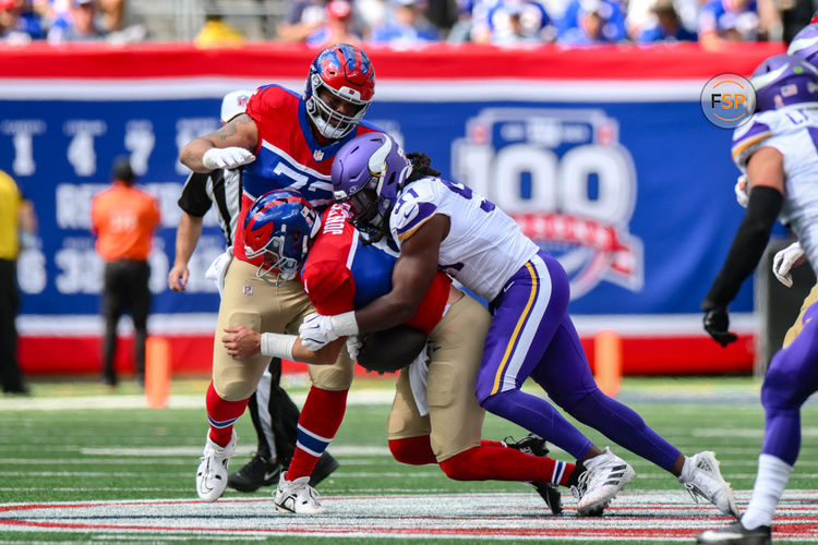 Sep 8, 2024; East Rutherford, New Jersey, USA; Minnesota Vikings linebacker Pat Jones II (91) sacks New York Giants quarterback Daniel Jones (8) during the second half at MetLife Stadium. Credit: John Jones-Imagn Images