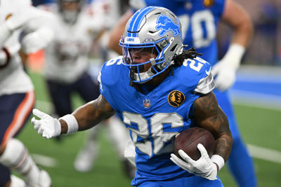 Nov 28, 2024; Detroit, Michigan, USA; Detroit Lions running back Jahmyr Gibbs (26) runs the ball against the Chicago Bears in the first quarter at Ford Field. Mandatory Credit: Lon Horwedel-Imagn Images