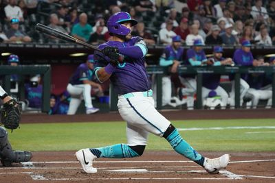 Apr 23, 2026; Phoenix, Arizona, USA; Arizona Diamondbacks second baseman Ildemaro Vargas (6) hits against the Chicago White Sox in the first inning at Chase Field. Mandatory Credit: Rick Scuteri-Imagn Images