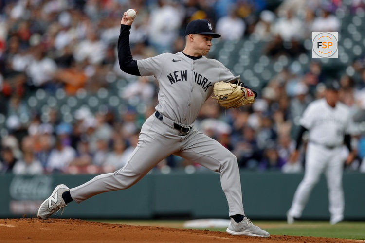 May 25, 2025; Denver, Colorado, USA; New York Yankees starting pitcher Will Warren (98) pitches in the first inning against the Colorado Rockies at Coors Field. Credit: Isaiah J. Downing-Imagn Images