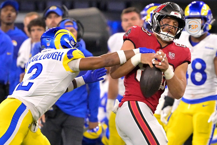 Nov 23, 2025; Inglewood, California, USA; Los Angeles Rams safety Jaylen McCollough (2) breaks up a pass for Tampa Bay Buccaneers tight end Cade Otton (88) in the first half at SoFi Stadium. Credit: Jayne Kamin-Oncea-Imagn Images
