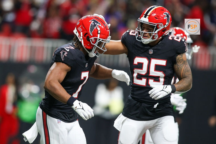 Nov 26, 2023; Atlanta, Georgia, USA; Atlanta Falcons running back Bijan Robinson (7) celebrates after a touchdown with running back Tyler Allgeier (25) against the New Orleans Saints in the second quarter at Mercedes-Benz Stadium. Credit: Brett Davis-USA TODAY Sports