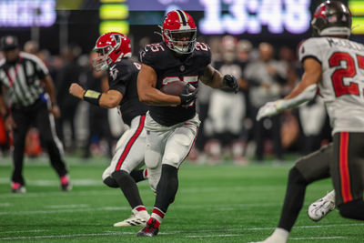 Oct 3, 2024; Atlanta, Georgia, USA; Atlanta Falcons running back Tyler Allgeier (25) runs the ball against the Tampa Bay Buccaneers in the fourth quarter at Mercedes-Benz Stadium. Mandatory Credit: Brett Davis-Imagn Images
