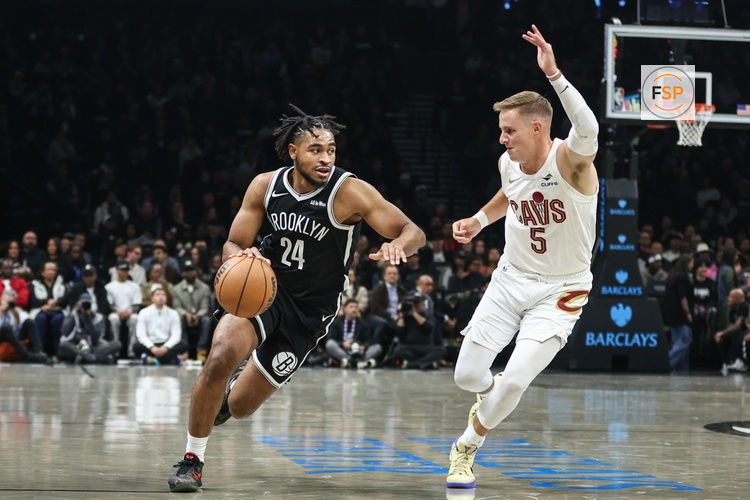 Oct 24, 2025; Brooklyn, New York, USA;  Brooklyn Nets guard Cam Thomas (24) looks to drive past Cleveland Cavaliers guard Sam Merrill (5) in the first quarter at Barclays Center. Credit: Wendell Cruz-Imagn Images