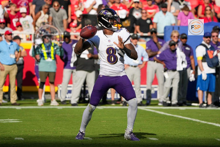 Sep 28, 2025; Kansas City, Missouri, USA; Baltimore Ravens quarterback Lamar Jackson (8) throws a pass against the Kansas City Chiefs during the game at GEHA Field at Arrowhead Stadium. Credit: Denny Medley-Imagn Images