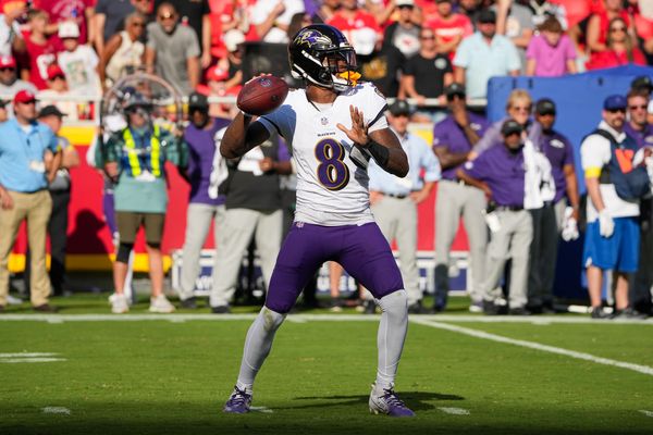 Sep 28, 2025; Kansas City, Missouri, USA; Baltimore Ravens quarterback Lamar Jackson (8) throws a pass against the Kansas City Chiefs during the game at GEHA Field at Arrowhead Stadium. Mandatory Credit: Denny Medley-Imagn Images