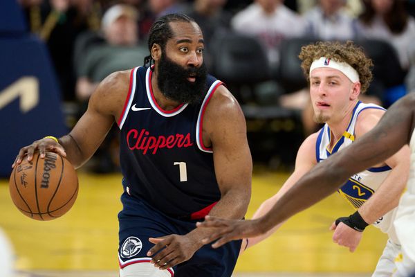 Apr 13, 2025; San Francisco, California, USA; LA Clippers guard James Harden (1) controls the ball against Golden State Warriors guard Brandin Podziemski (2) during the third quarter at Chase Center. Mandatory Credit: Robert Edwards-Imagn Images