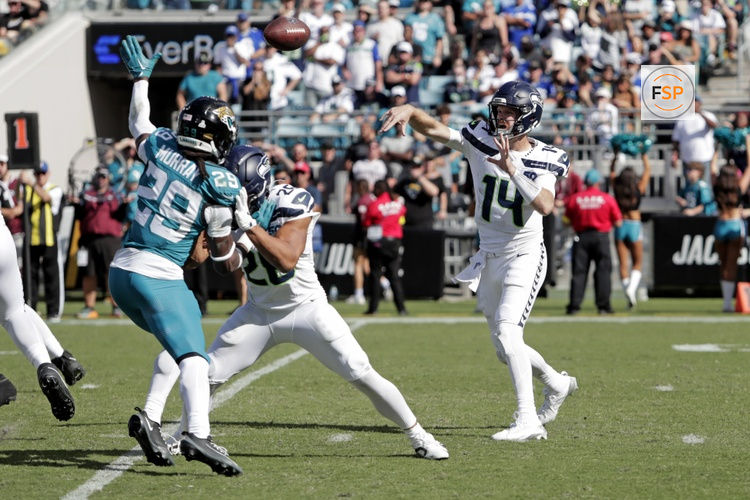 Oct 12, 2025; Jacksonville, Florida, USA; Seattle Seahawks quarterback Sam Darnold (14) throws a pass during the second half against the Jacksonville Jaguars at EverBank Stadium. Credit: Travis Register-Imagn Images