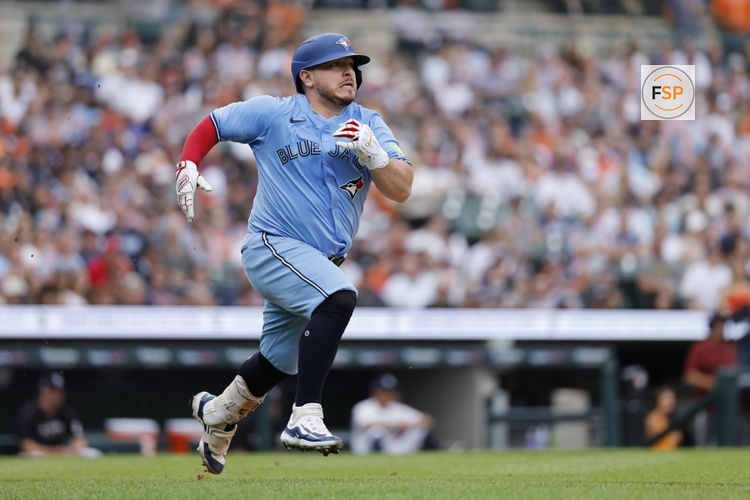 Jul 26, 2025; Detroit, Michigan, USA;  Toronto Blue Jays catcher Alejandro Kirk (30) runs to first after he hits a double in the second inning against the Detroit Tigers at Comerica Park. Credit: Rick Osentoski-Imagn Images