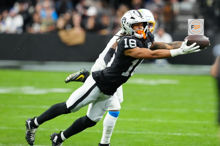 Jan 5, 2025; Paradise, Nevada, USA; Las Vegas Raiders wide receiver Jakobi Meyers (16) makes a catch against the Los Angeles Chargers during the first quarter at Allegiant Stadium. Credit: Stephen R. Sylvanie-Imagn Images