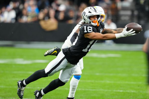 Jan 5, 2025; Paradise, Nevada, USA; Las Vegas Raiders wide receiver Jakobi Meyers (16) makes a catch against the Los Angeles Chargers during the first quarter at Allegiant Stadium. Mandatory Credit: Stephen R. Sylvanie-Imagn Images