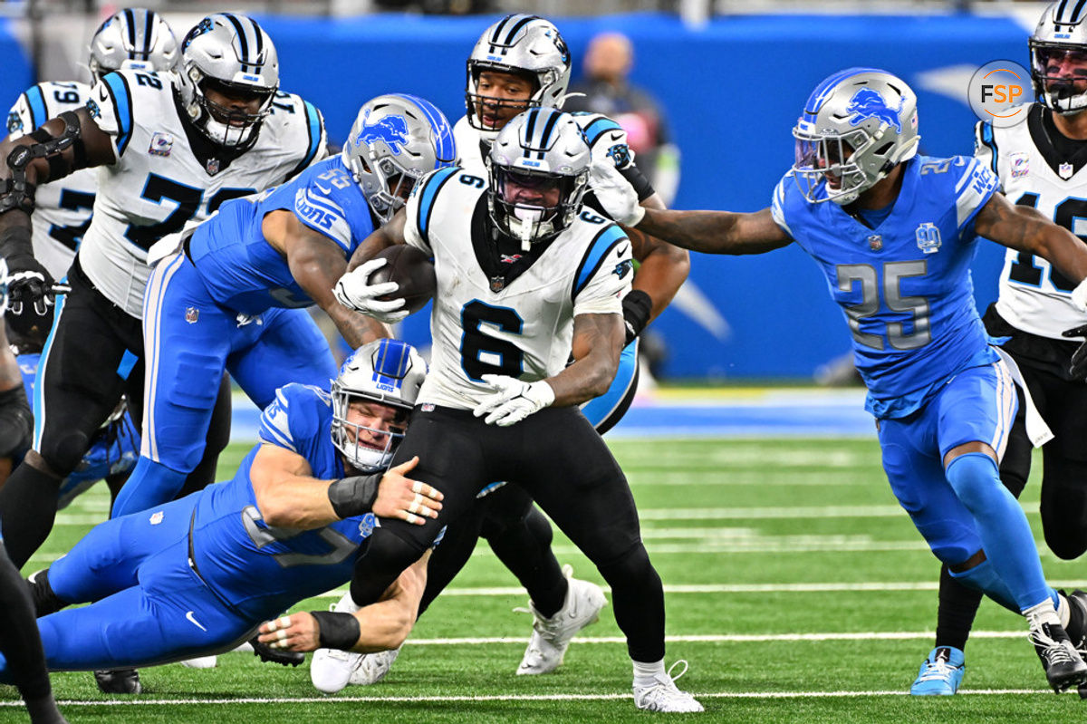 DETROIT, MI - OCTOBER 08: Carolina Panthers running back Miles Sanders (6) breaks through a hole in the line for a first down run during the Detroit Lions versus the Carolina Panthers game on Sunday October 8, 2023 at Ford Field in Detroit, MI. (Photo by Steven King/Icon Sportswire)