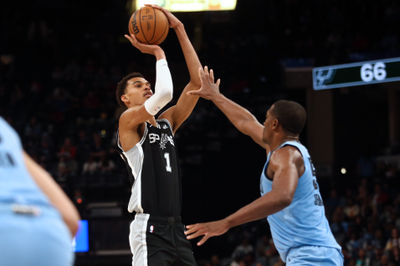 Apr 9, 2024; Memphis, Tennessee, USA; San Antonio Spurs center Victor Wembanyama (1) shoots as Memphis Grizzlies center Trey Jemison (55) defends during the second half at FedExForum. Mandatory Credit: Petre Thomas-USA TODAY Sports