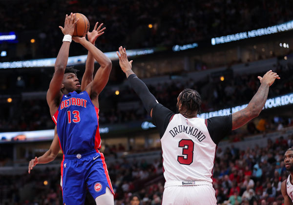 CHICAGO, IL - APRIL 09: Detroit Pistons center James Wiseman (13) shoots the ball over Chicago Bulls center Andre Drummond (3) during a NBA game between the Detroit Pistons and the Chicago Bulls on April 9, 2023 at the United Center in Chicago, IL. (Photo by Melissa Tamez/Icon Sportswire)