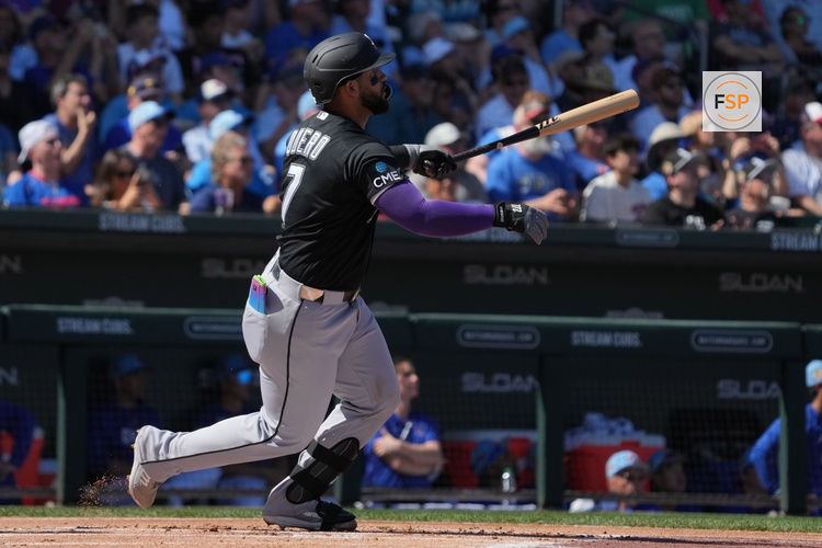 Mar 1, 2026; Mesa, Arizona, USA; Chicago White Sox catcher Edgar Quero (7) hits a solo home run against the Chicago Cubs in the first inning at Sloan Park. Credit: Rick Scuteri-Imagn Images