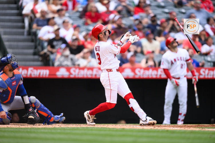 May 3, 2026; Anaheim, California, USA; Los Angeles Angels shortstop Zach Neto (9) drops his bat while swinging during the third inning against the New York Mets at Angel Stadium. Credit: William Liang-Imagn Images