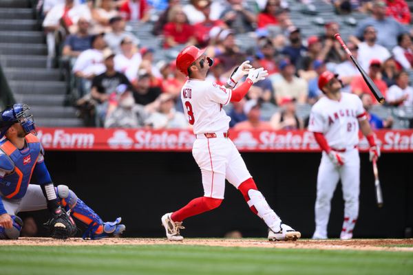 May 3, 2026; Anaheim, California, USA; Los Angeles Angels shortstop Zach Neto (9) drops his bat while swinging during the third inning against the New York Mets at Angel Stadium. Mandatory Credit: William Liang-Imagn Images