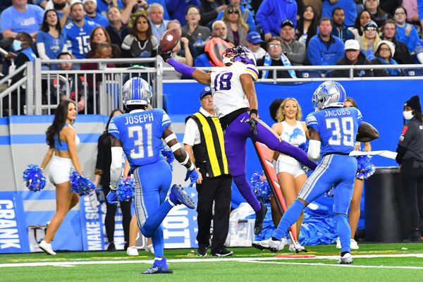 DETROIT, MI - DECEMBER 11: Minnesota Vikings wide receiver Justin Jefferson (18) can’t control this pass on the sidelines during the Detroit Lions versus the Minnesota Vikings game on Sunday December 11, 2022 at Ford Field in Detroit, MI. (Photo by Steven King/Icon Sportswire)