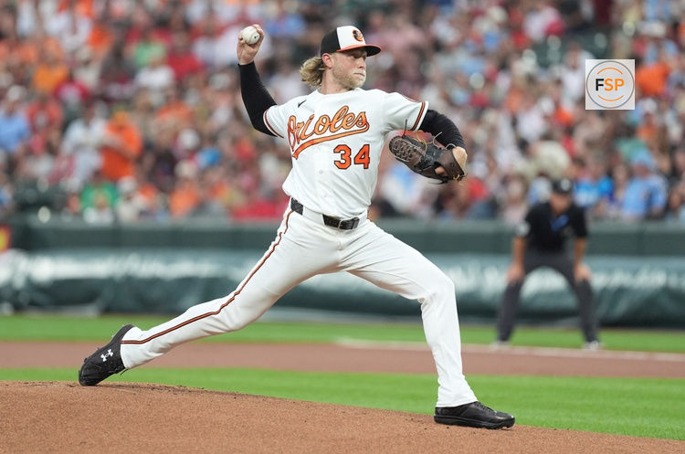 Aug 1, 2026; Baltimore, Maryland, USA; Baltimore Orioles pitcher Shane Baz (34) throws a pitch against the Philadelphia Phillies during the first inning at Oriole Park at Camden Yards. Credit: Gregory Fisher-Imagn Images