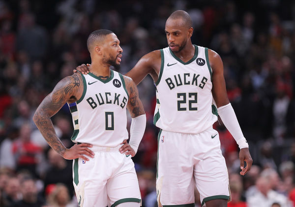 CHICAGO, IL - NOVEMBER 30: Khris Middleton #22 of the Milwaukee Bucks chats with Damian Lillard #0 of the Milwaukee Bucks during the second half against the Chicago Bulls at the United Center on November 30, 2023 in Chicago, Illinois. (Photo by Melissa Tamez/Icon Sportswire)