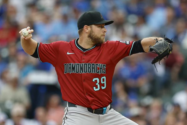 Apr 18, 2025; Chicago, Illinois, USA; Arizona Diamondbacks starting pitcher Corbin Burnes (39) delivers a pitch against the Chicago Cubs during the first inning at Wrigley Field. Mandatory Credit: Kamil Krzaczynski-Imagn Images