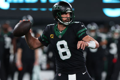 Oct 31, 2024; East Rutherford, New Jersey, USA; New York Jets quarterback Aaron Rodgers (8) throws a pass against the Houston Texans during the first half at MetLife Stadium. Mandatory Credit: Ed Mulholland-Imagn Images