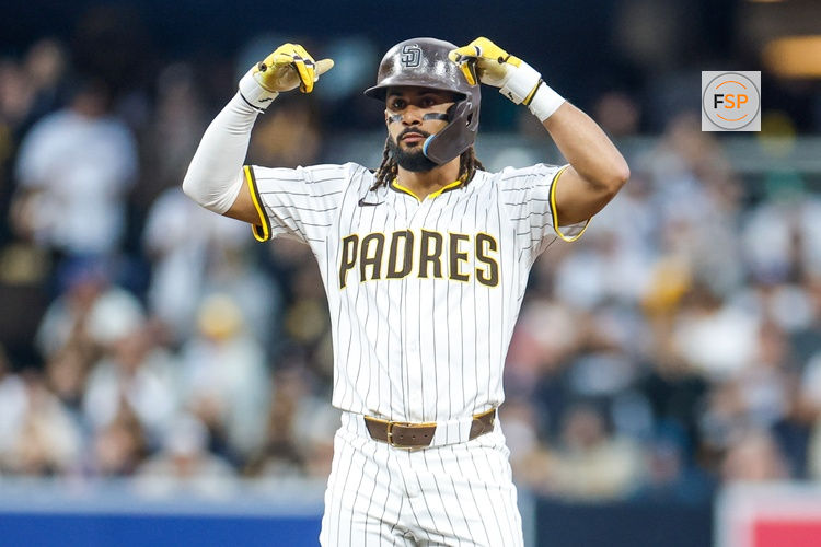 May 17, 2025; San Diego, California, USA; San Diego Padres right fielder Fernando Tatis Jr. (23) celebrates with the dugout after hitting a double during the fifth inning against the Seattle Mariners at Petco Park. Credit: David Frerker-Imagn Images