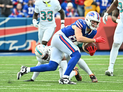 Nov 3, 2024; Orchard Park, New York, USA; Buffalo Bills tight end Dalton Kincaid (86) makes a catch against the Miami Dolphins in the third quarter at Highmark Stadium. Mandatory Credit: Mark Konezny-Imagn Images