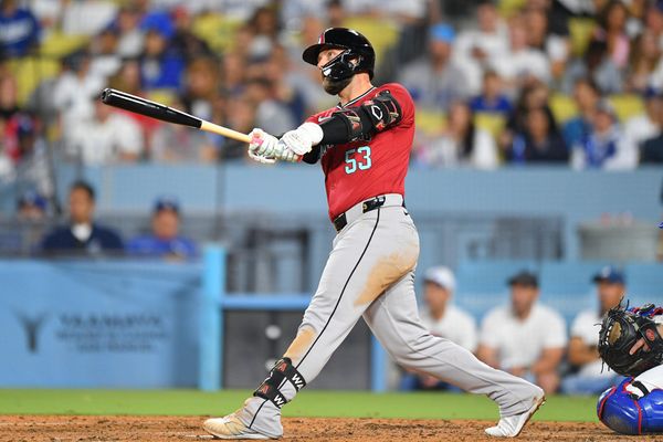 LOS ANGELES, CA - JULY 03: Arizona Diamondbacks first baseman Christian Walker (53) watches his home run during the MLB game between the Arizona Diamondbacks and the Los Angeles Dodgers on July 3, 2024 at Dodger Stadium in Los Angeles, CA. (Photo by Brian Rothmuller/Icon Sportswire)