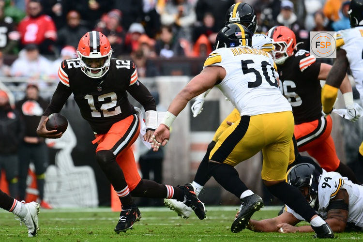 Dec 28, 2025; Cleveland, Ohio, USA; Cleveland Browns quarterback Shedeur Sanders (12) runs the ball in the second quarter against the Pittsburgh Steelers at Huntington Bank Field. Credit: Ken Blaze-Imagn Images