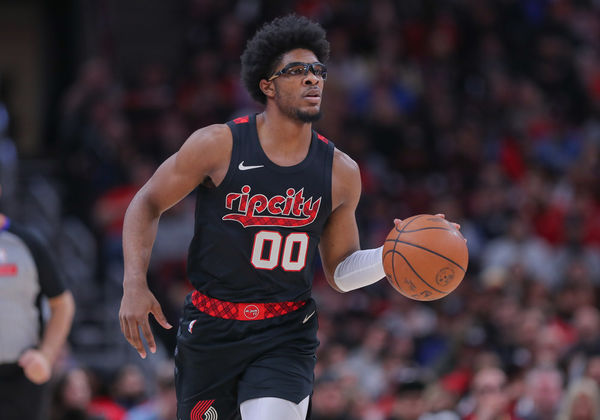 CHICAGO, IL - MARCH 18: Scoot Henderson #00 of the Portland Trail Blazers brings the ball up court during the first half against the Chicago Bulls at the United Center on March 18, 2024 in Chicago, Illinois. (Photo by Melissa Tamez/Icon Sportswire)