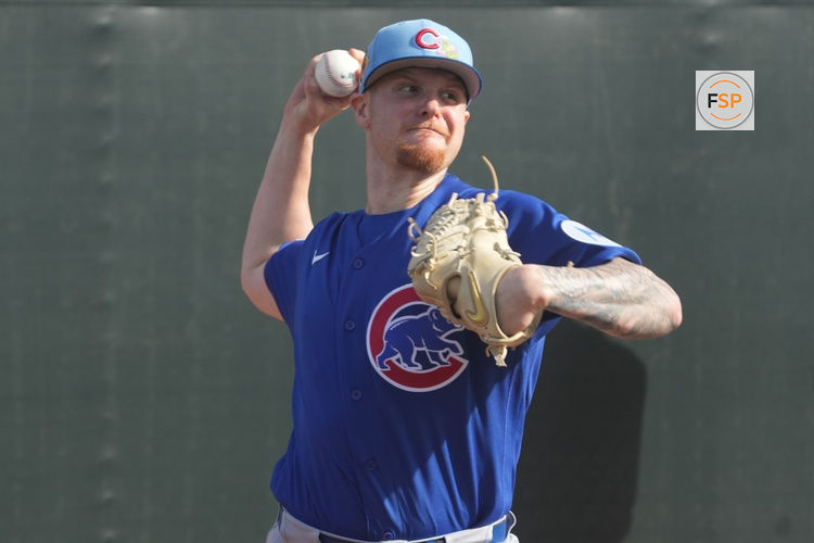 Feb 12, 2026; Mesa, AZ, USA; Chicago Cubs pitcher Cade Horton (22) throws in the bullpen during spring training camp at Sloan Park. Credit: Rick Scuteri-Imagn Images