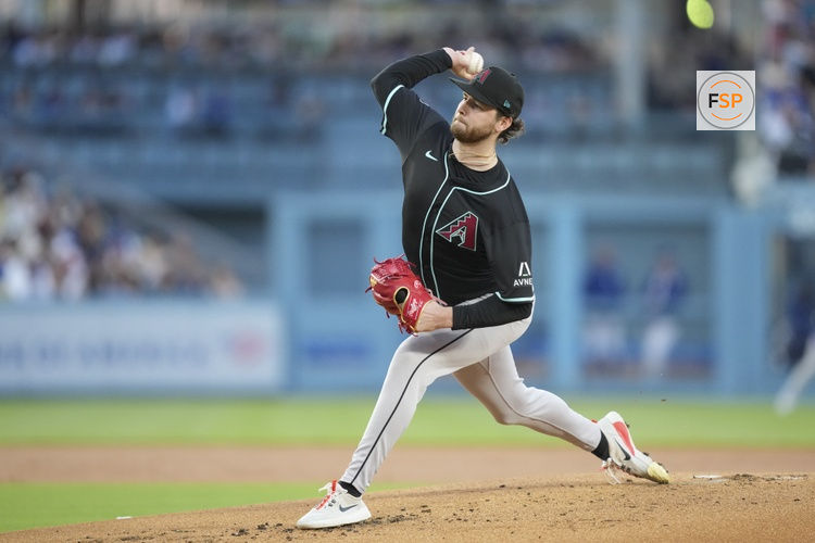May 20, 2025; Los Angeles, California, USA; Arizona Diamondbacks pitcher Ryne Nelson (19) throws a pitch in the first inning against the Los Angeles Dodgers at Dodger Stadium. Credit: Kirby Lee-Imagn Images