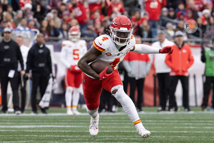 FOXBOROUGH, MA - DECEMBER 17: Kansas City Chiefs wide receiver Rashee Rice (4) turns after a catch during a game between the New England Patriots and the Kansas City Chiefs on December 17, 2023, at Gillette Stadium in Foxborough, Massachusetts. (Photo by Fred Kfoury III/Icon Sportswire)