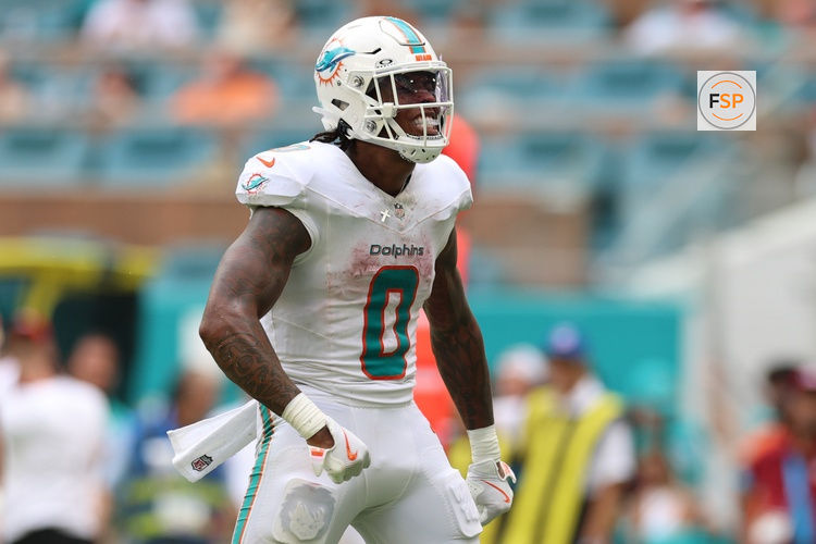Sep 27, 2026; Miami Gardens, Florida, USA;  Miami Dolphins running back Ollie Gordon II (0) reacts after a play against the Kansas City Chiefs during the third quarter at Hard Rock Stadium.  Credit: Nathan Ray Seebeck-Imagn Images