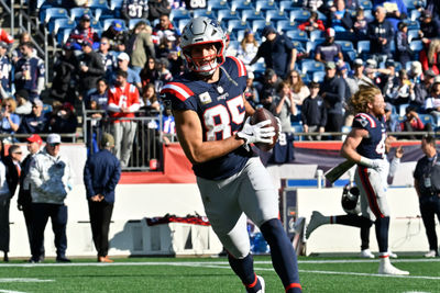 Nov 17, 2024; Foxborough, Massachusetts, USA; New England Patriots tight end Hunter Henry (85) warms up before a game against the Los Angeles Rams at Gillette Stadium. Mandatory Credit: Eric Canha-Imagn Images