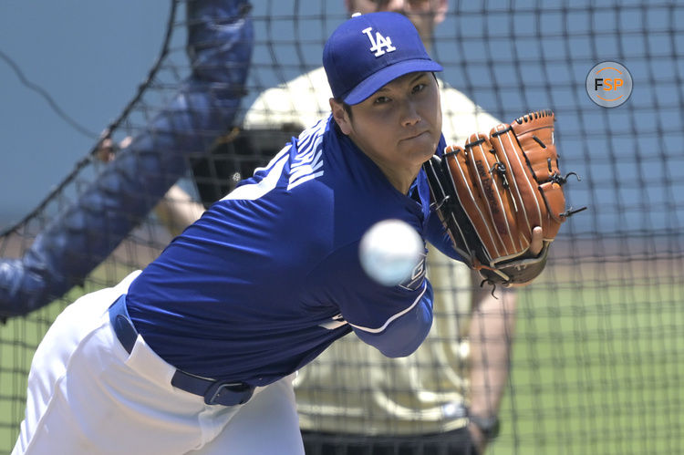 May 31, 2025; Los Angeles, California, USA;  Los Angeles Dodgers Shohei Ohtani (17) throws live batting practice prior to the game against the New York Yankees at Dodger Stadium. Credit: Jayne Kamin-Oncea-Imagn Images