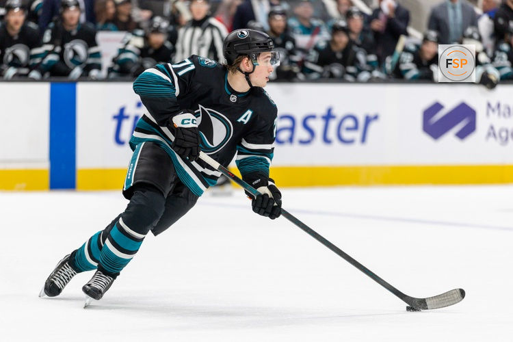 Nov 18, 2025; San Jose, California, USA; San Jose Sharks center Macklin Celebrini (71) skates with the puck during the first period against the Utah Mammoth at SAP Center at San Jose. Credit: Bob Kupbens-Imagn Images
