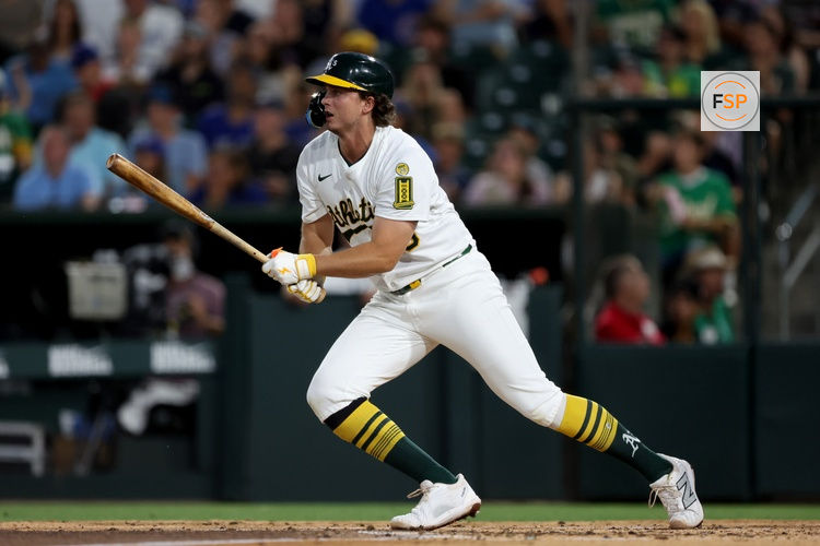 Jul 12, 2025; West Sacramento, California, USA; Athletics first baseman Nick Kurtz (16) hits a single against the Toronto Blue Jays during the fifth inning at Sutter Health Park. Credit: Dennis Lee-Imagn Images