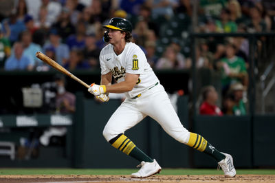 Jul 12, 2025; West Sacramento, California, USA; Athletics first baseman Nick Kurtz (16) hits a single against the Toronto Blue Jays during the fifth inning at Sutter Health Park. Mandatory Credit: Dennis Lee-Imagn Images