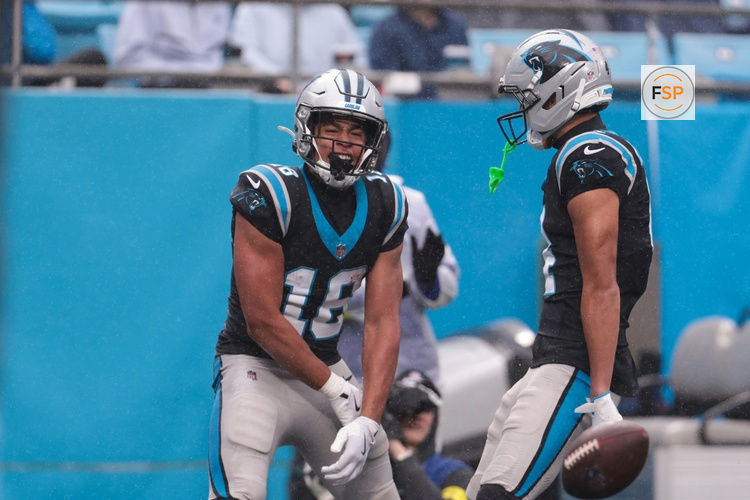 Nov 30, 2025; Charlotte, North Carolina, USA; Carolina Panthers wide receiver Jalen Coker (18) celebrates after scoring a touchdown during the third quarter at Bank of America Stadium. Credit: Scott Kinser-Imagn Images