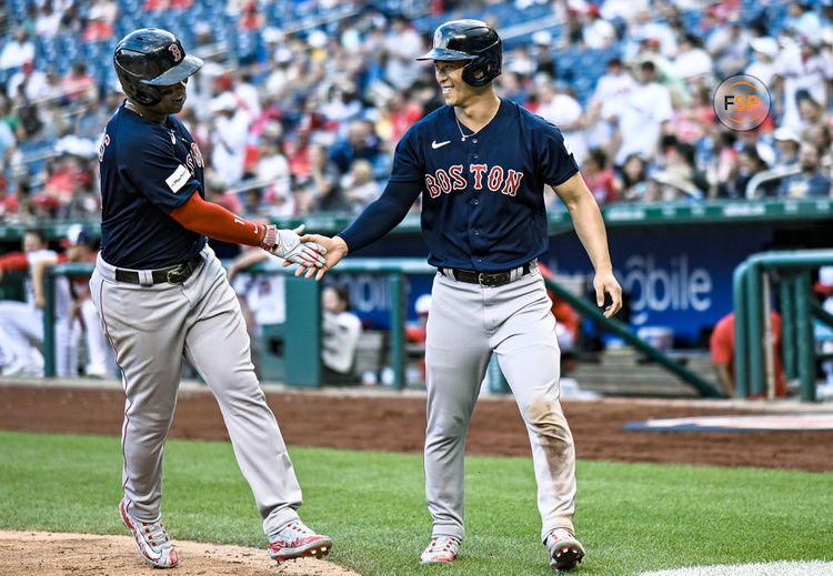 WASHINGTON, DC - August 17: Boston Red Sox third baseman Rafael Devers (11) is congratulated by left fielder Masataka Yoshida (7) after his home run during the Boston Red Sox versus the Washington Nationals on August 17, 2023 at Nationals Park in Washington, D.C.  (Photo by Mark Goldman/Icon Sportswire)