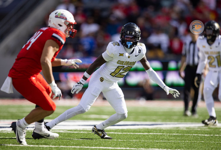 Oct 19, 2024; Tucson, Arizona, USA; Colorado Buffalos cornerback Travis Hunter (12) against the Arizona Wildcats at Arizona Stadium. Credit: Mark J. Rebilas-Imagn Images