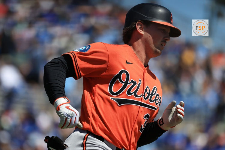 Mar 18, 2026; Dunedin, Florida, USA;  Baltimore Orioles catcher Adley Rutschman (35) singles during the first inning against the Toronto Blue Jays at TD Ballpark. Credit: Kim Klement Neitzel-Imagn Images